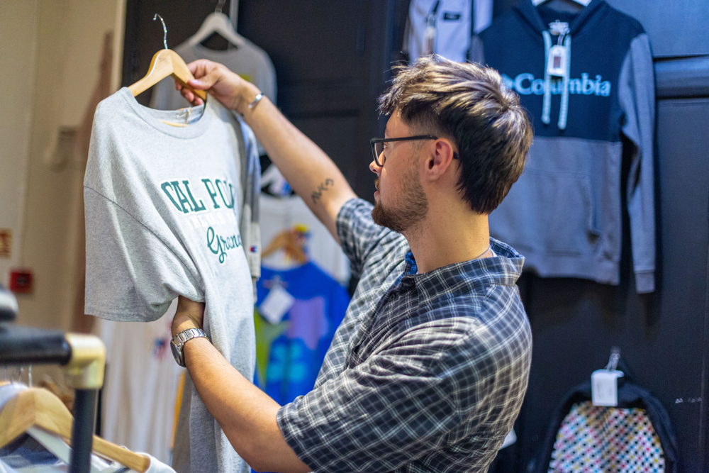 Students look at products in a shop