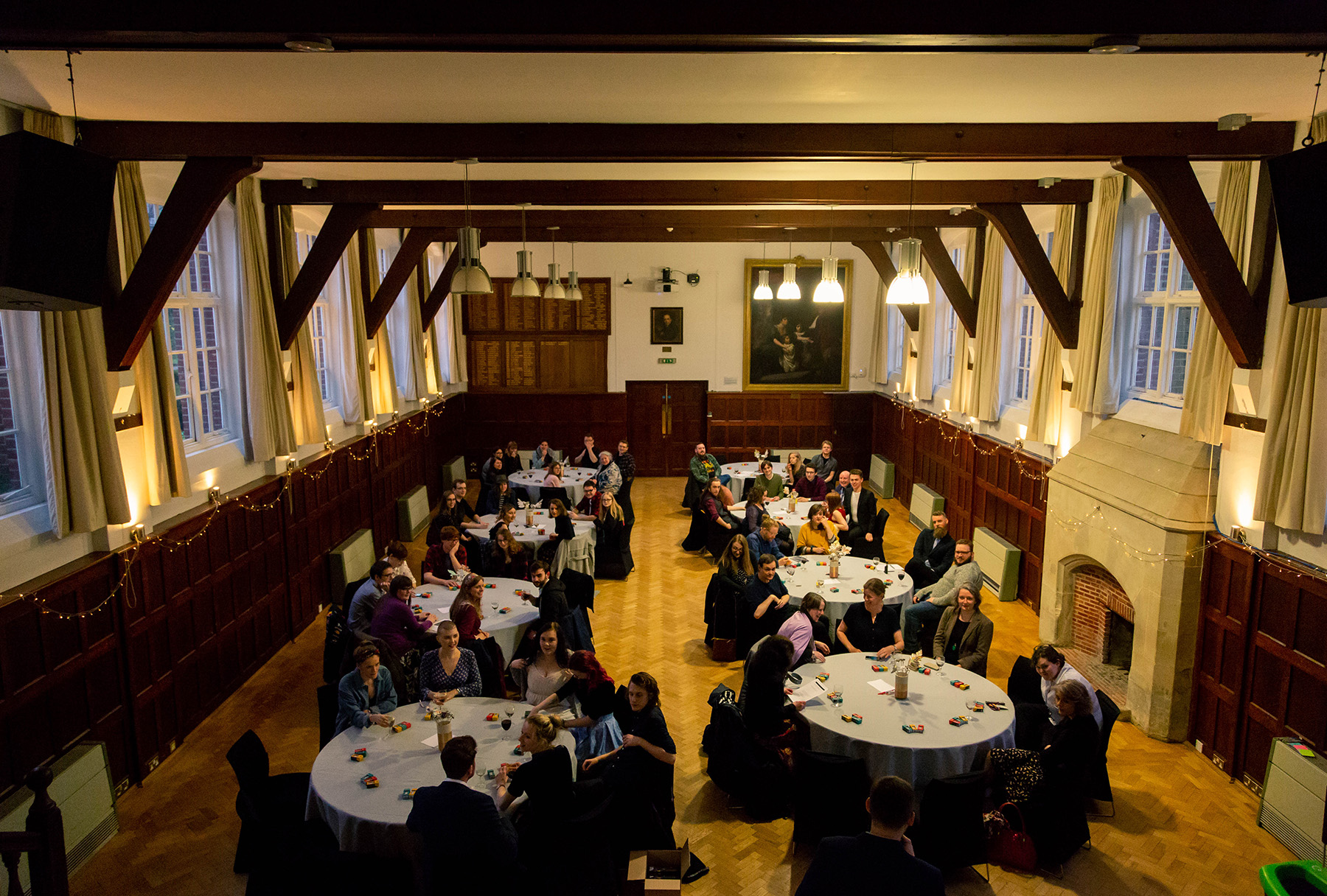 Large hall with guests sat at tables