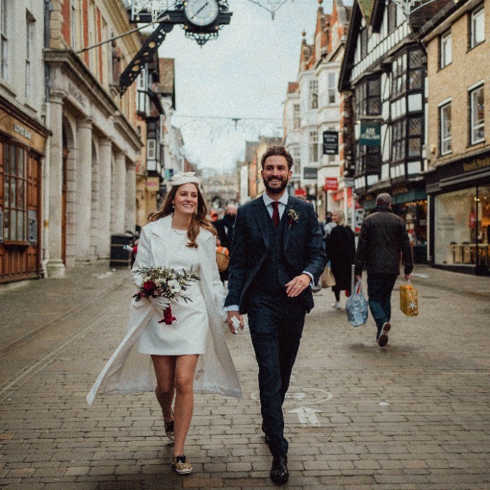 Wedding couple in front of cathedral