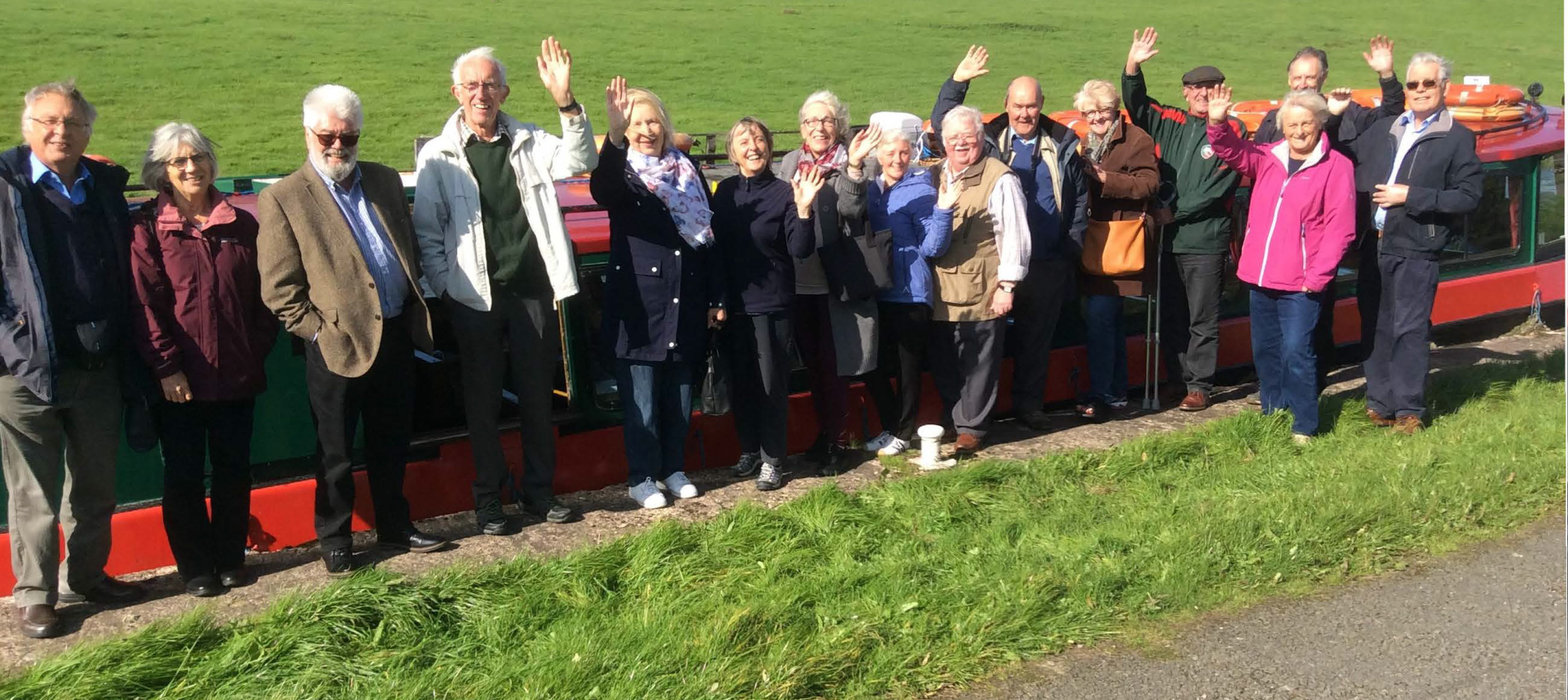 Group of people waving