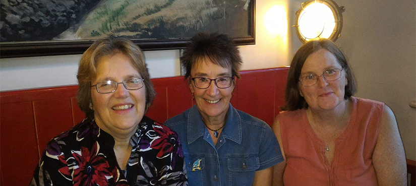 Three women sitting