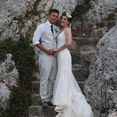 Bride and groom on Greek island steps