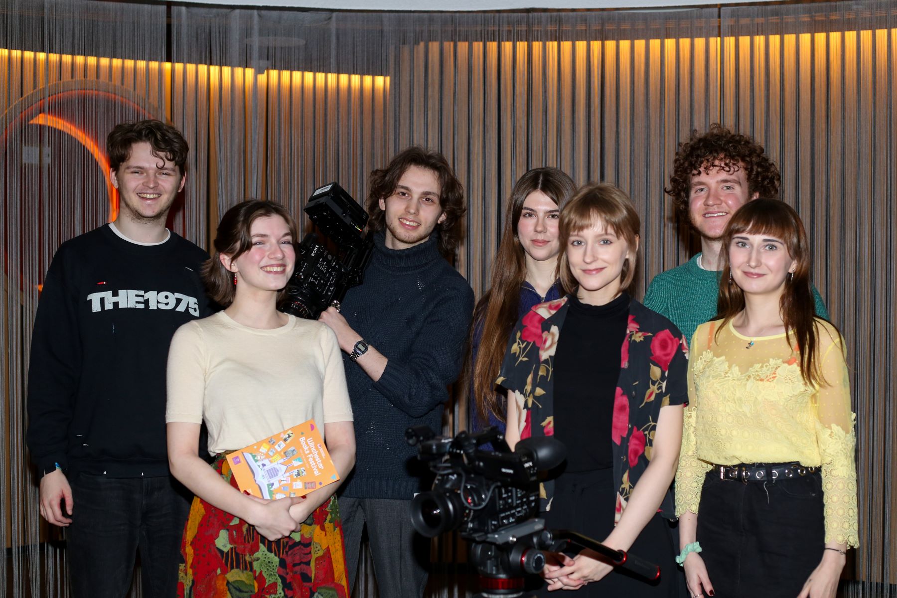 Young people with camera equipment