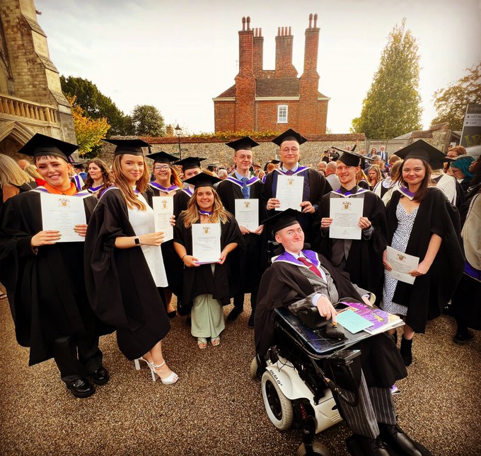 Graduates in gowns and mortar boards