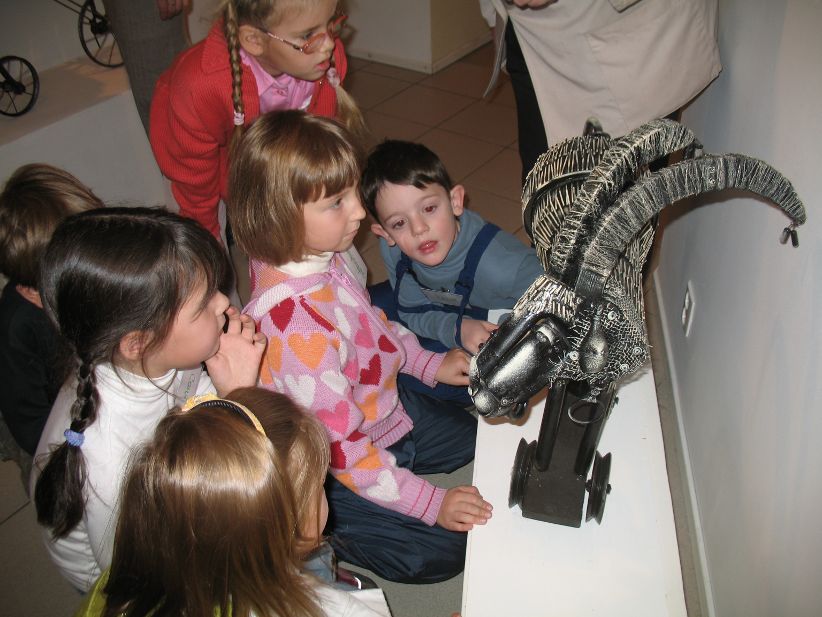 Young children looking at museum exhibit