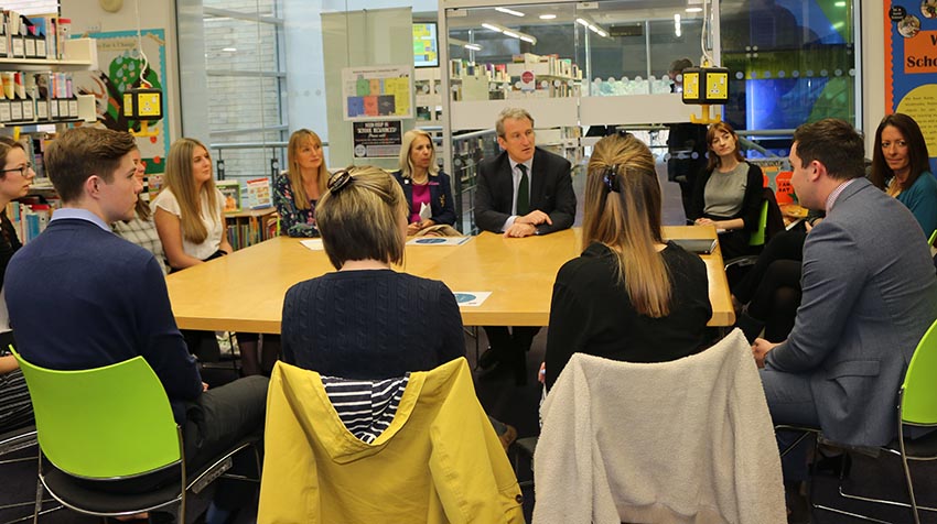 Damian Hinds with teaching students