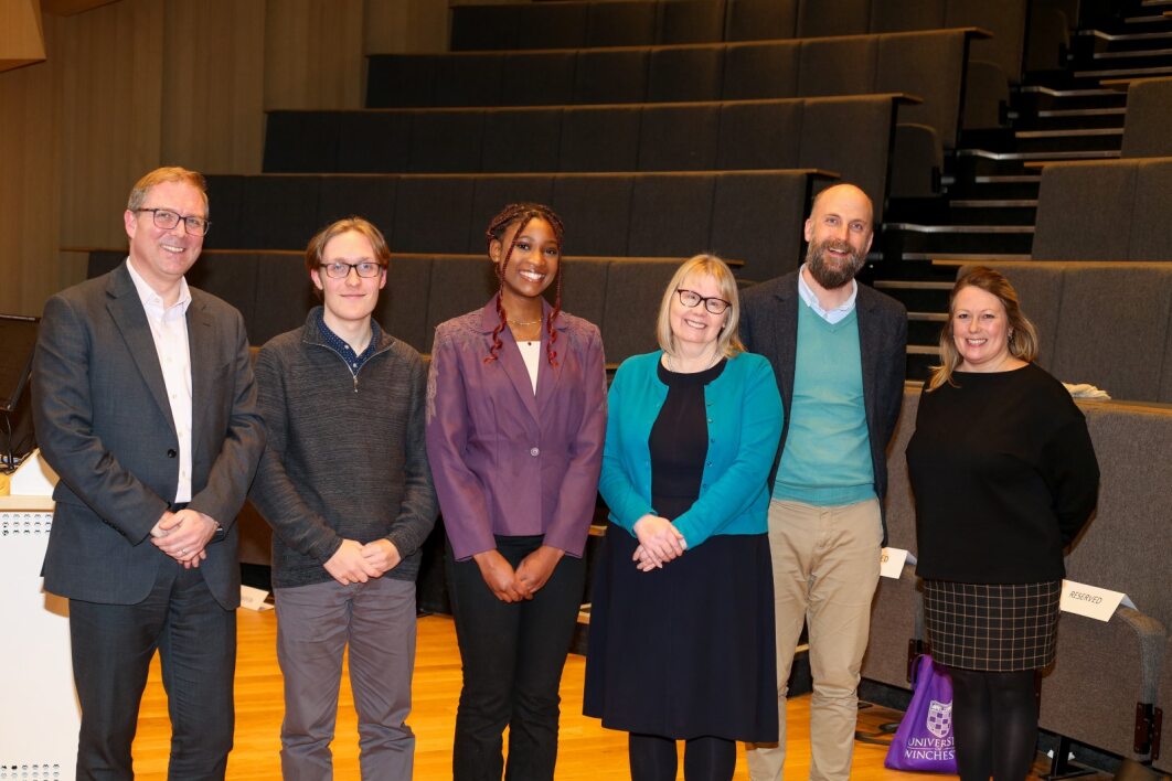 Line up of students and older people