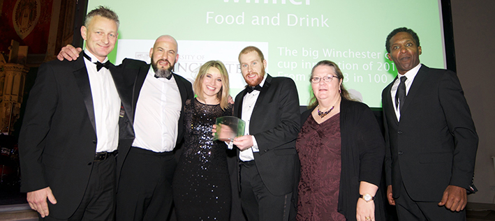 University staff receiving their green gown award 