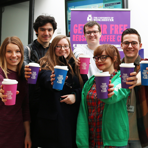 Group of University students pose with their reusable cups