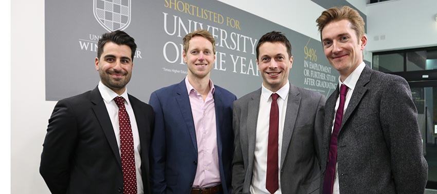 Four male members of the HELP Hampshire team at the launch event 