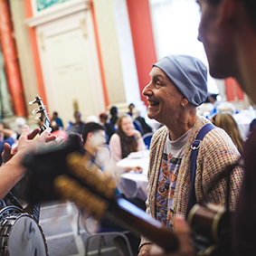 Female care home resident listening to music