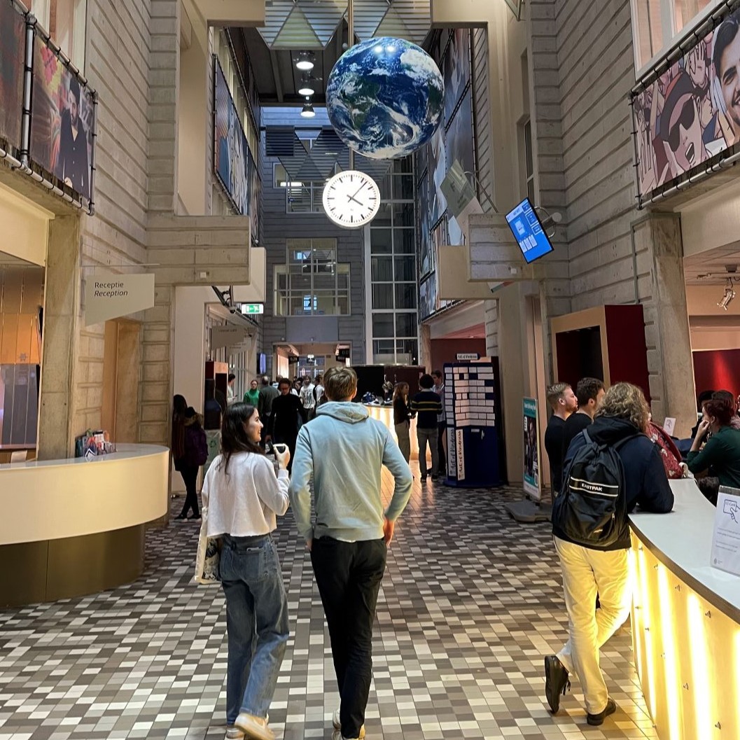 modern atrium with globe hanging from ceiling