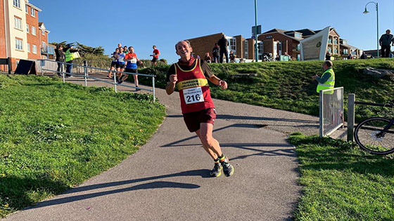 Man running through park