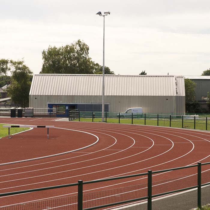 Grop celebrate arrivel of Baton outside the Leisure Park