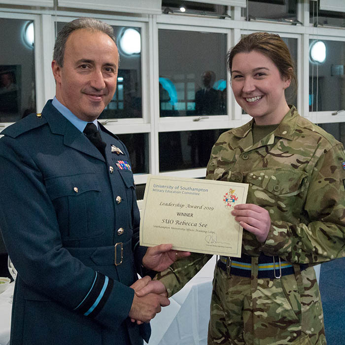 Presentation of award to Rebecca in uniform