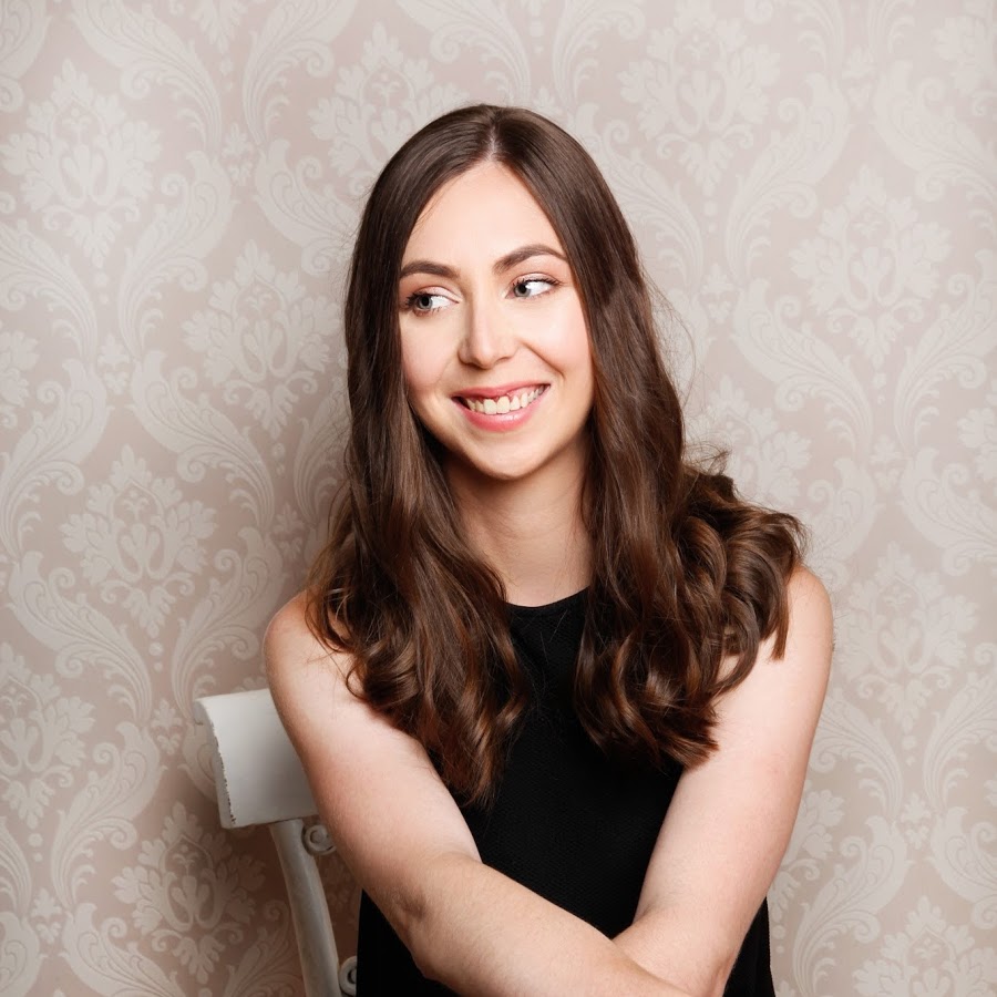 Young woman with shoulder-length dark brown hair