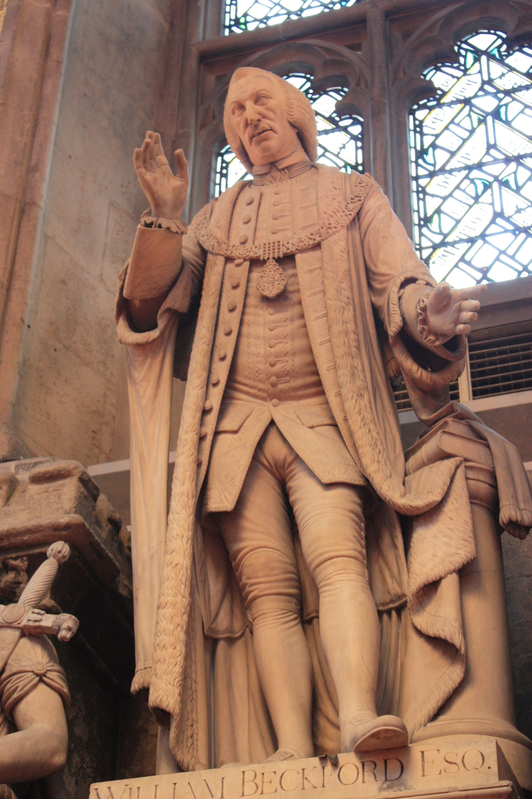 Statue of man in 18th century clothing