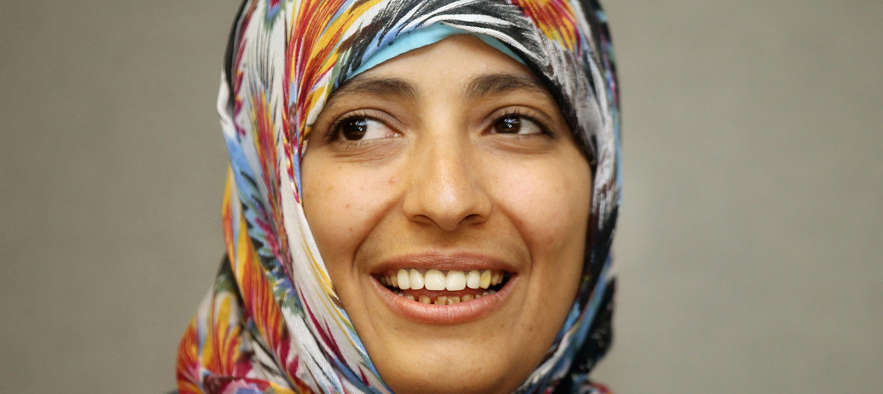 Head and shoulders of woman wearing patterned hijab