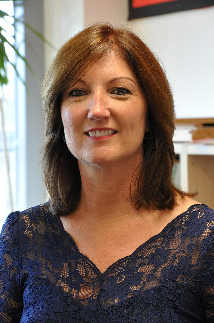 Woman with mid length brown hair