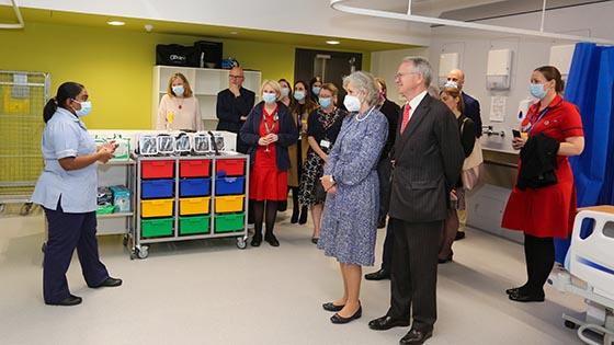 Student nurse showing visitors around the facilities