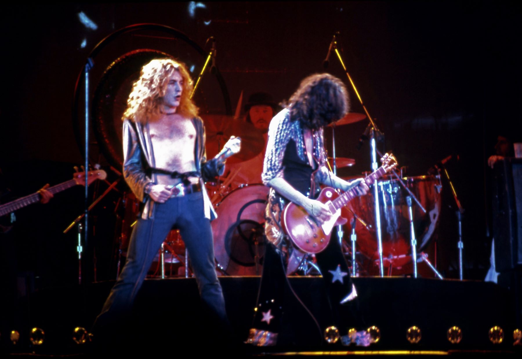 Long haired rock singers on stage