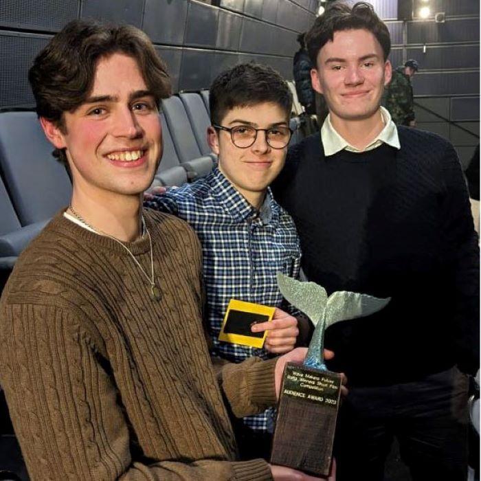Students with film trophy