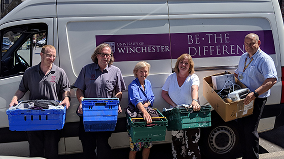 Volunteers with donations for bag it up initiative