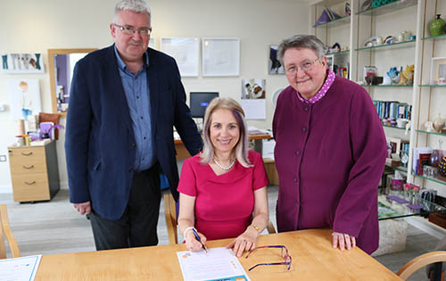 Terry Biddington, Dean of Chapel; Joy Carter, Vice-Chancellor and Elizabeth Stuart, First Deputy Vice-Chancellor signing the Charter for Faith and Belief