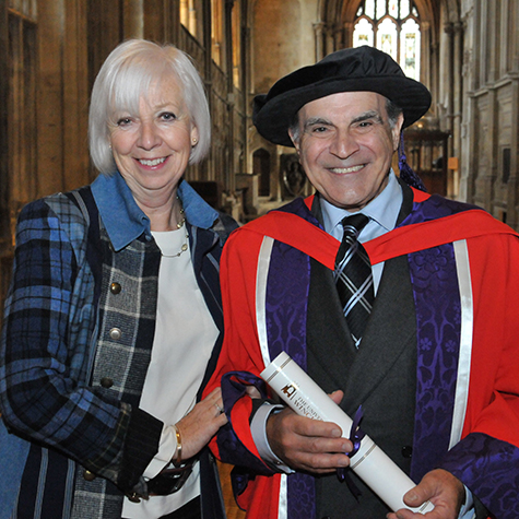 David Suchet smiles with wife after receiving honorary degree