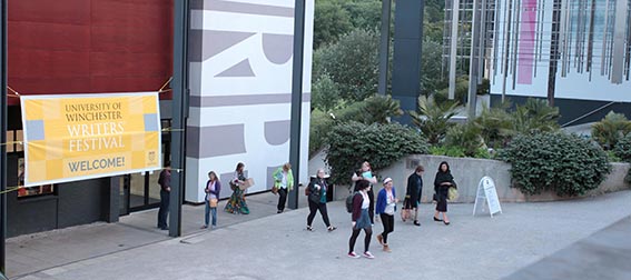 Exterior of Stripe building with 'Writer's Festival' banner displayed