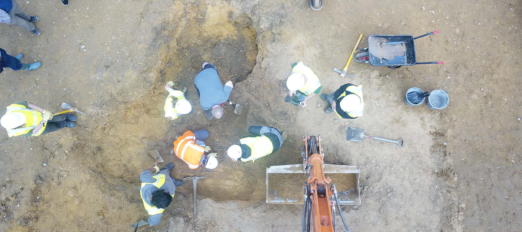 Birdseye view of construction workers digging