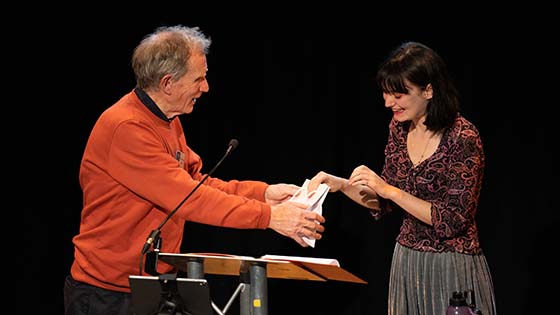 Imogen receiving her prize at the poetry festival