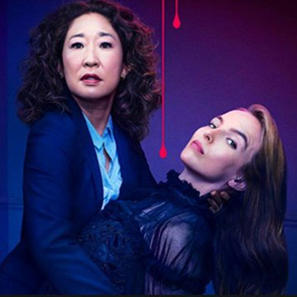 Eve and Villanelle, the characters from Killing Eve standing shoulder to shoulder