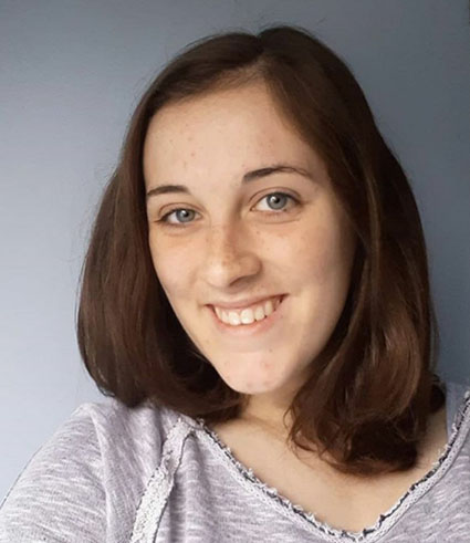 Head and shoulders of Libby Wakefield; young woman with brown hair