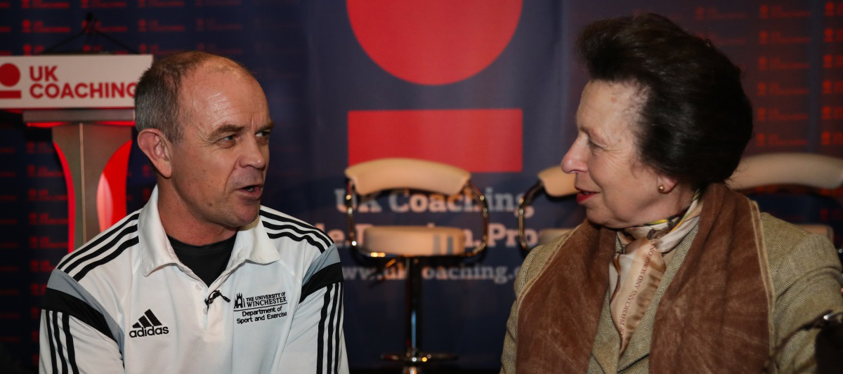 Richard Cheetham speaking with woman at UK Coaching's inaugural coaching research conference