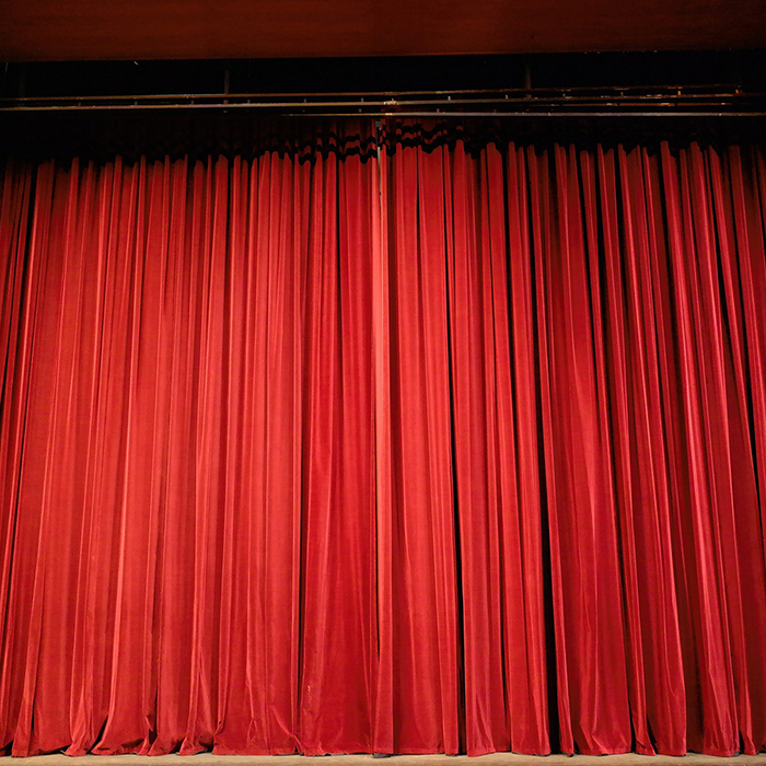 Closed red stage curtains