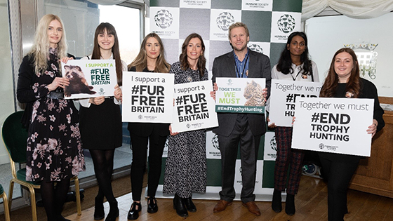 Students holding fur free Britain placards