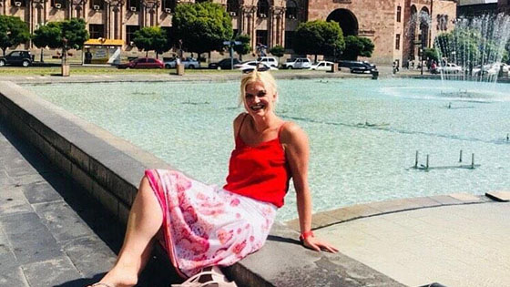 Ulrike Ziemer sitting in Republic Square in Yerevan 