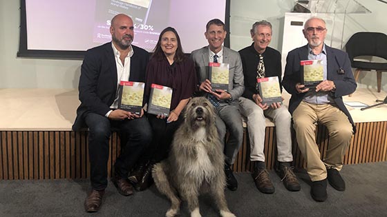 Andrew Knight and peter Egan holding copies of the book at the launch event