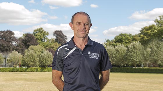 Richard Cheetham in sports kit standing on a sports pitch