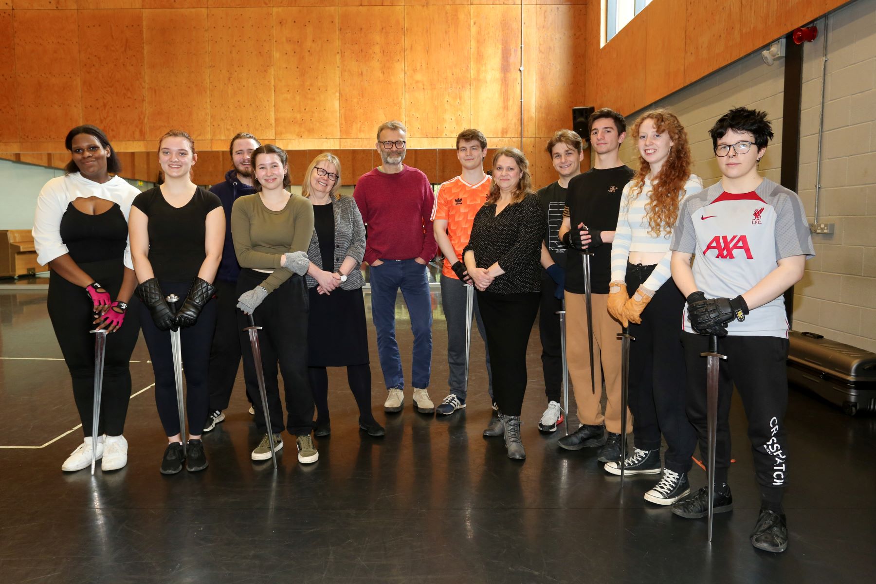 Students with fencing swords