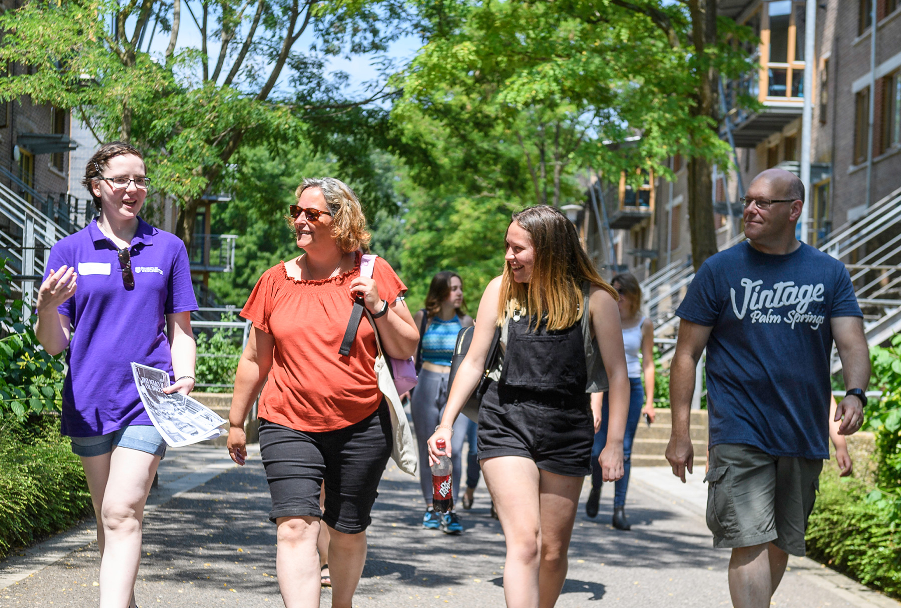 Family having a tour of our campus