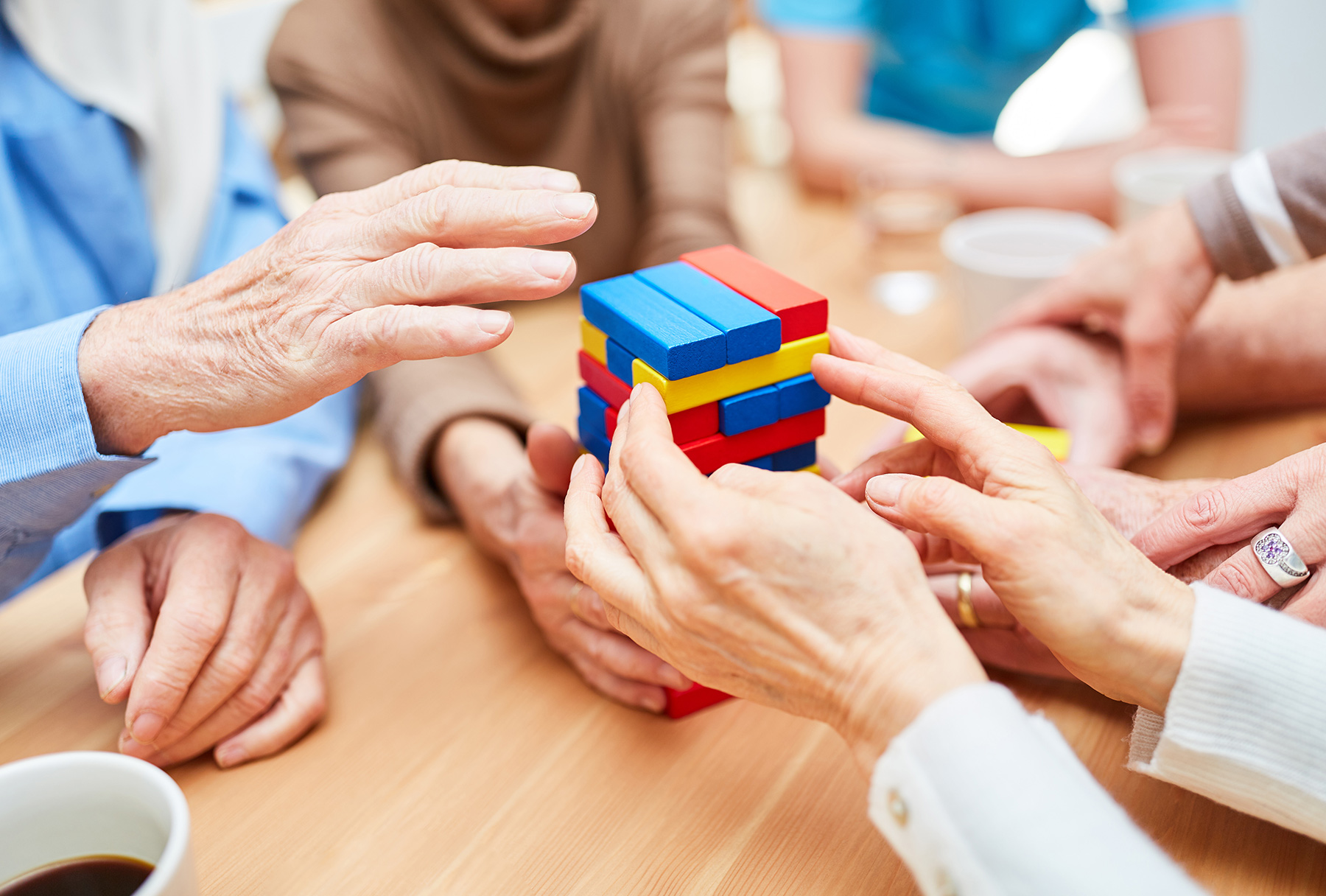 Elderly group of people playing board games