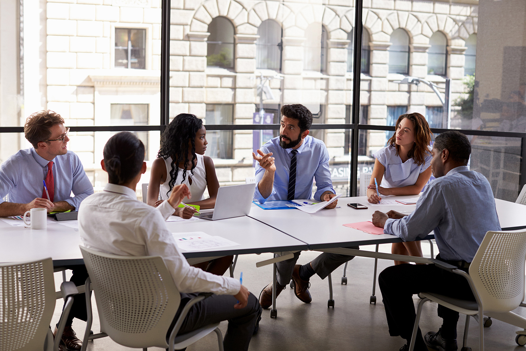 Group of people having a meeting in an office setting