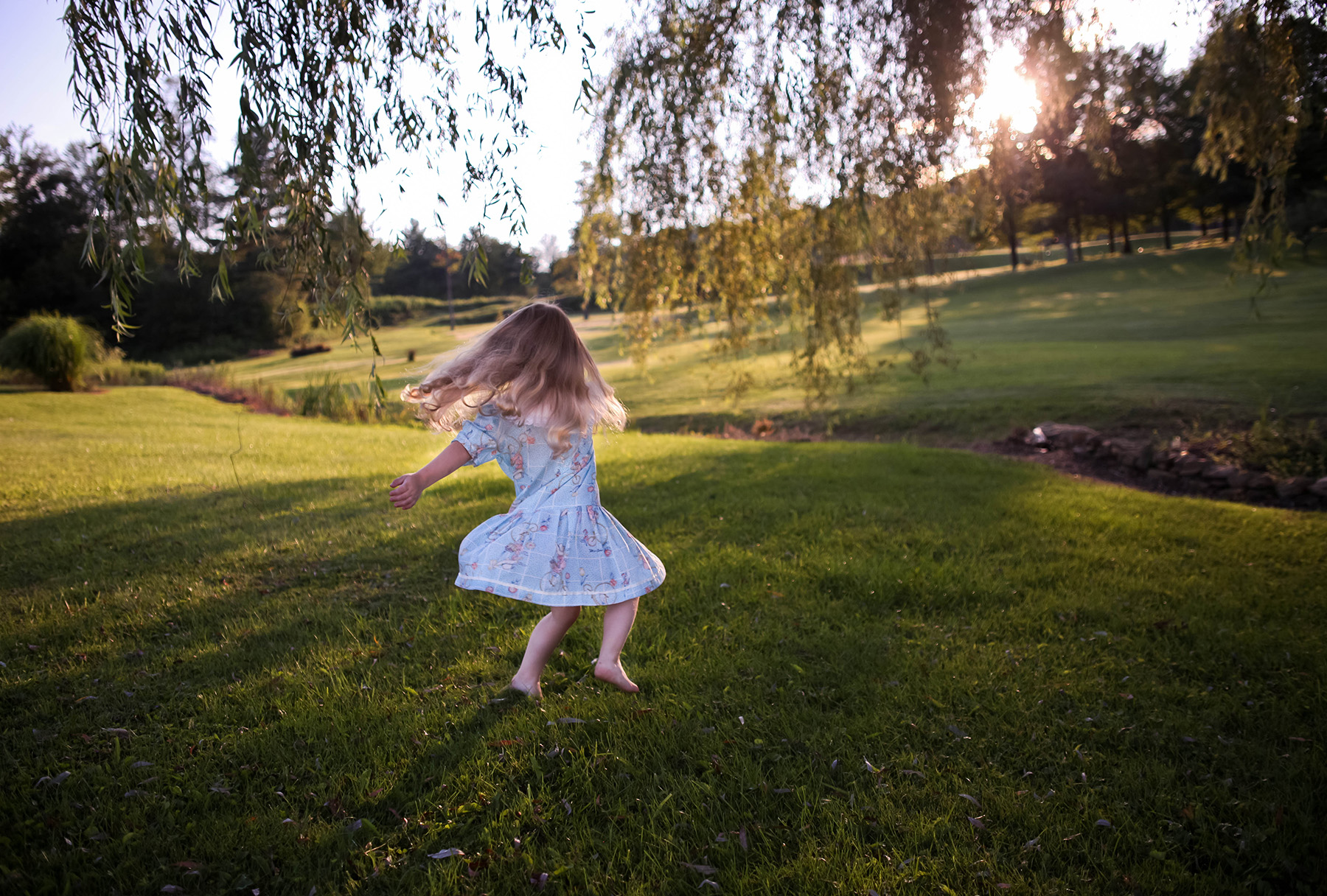 Child playing in a garden