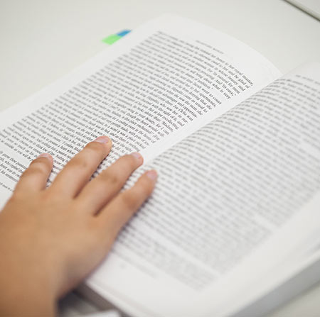 Student reading a book