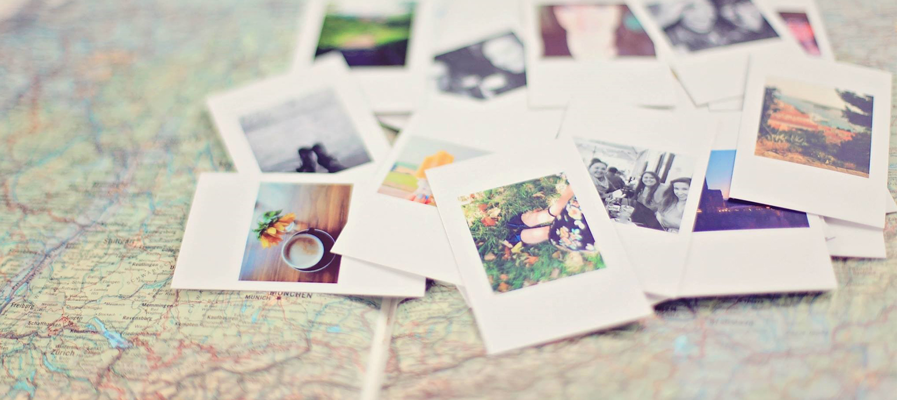 Polaroid pictures on a map