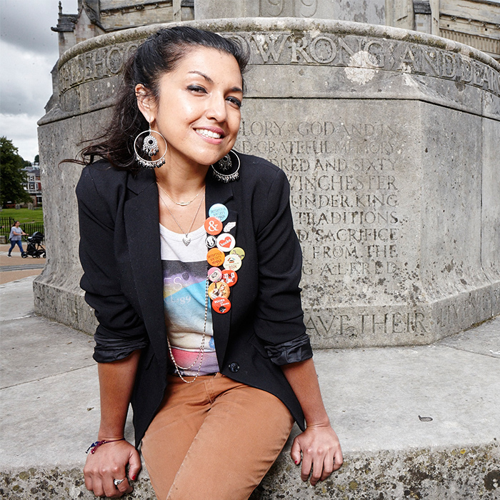 Student sat by cathedral