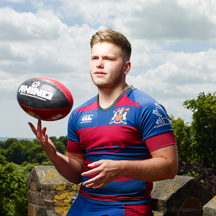 Student with rugby ball