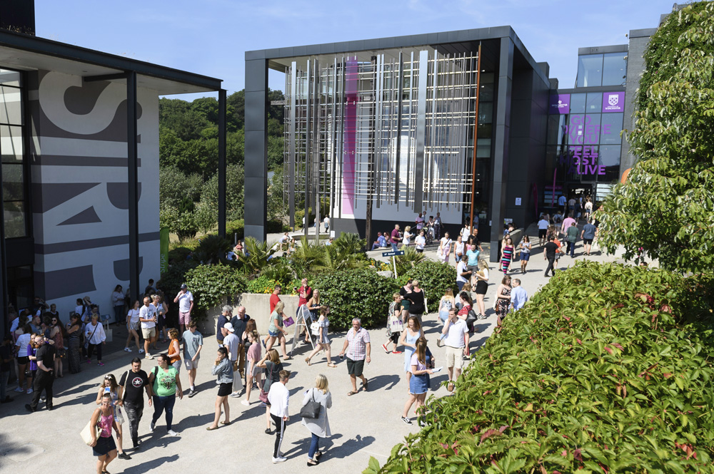 Plaza busy with people on campus at an Open Day